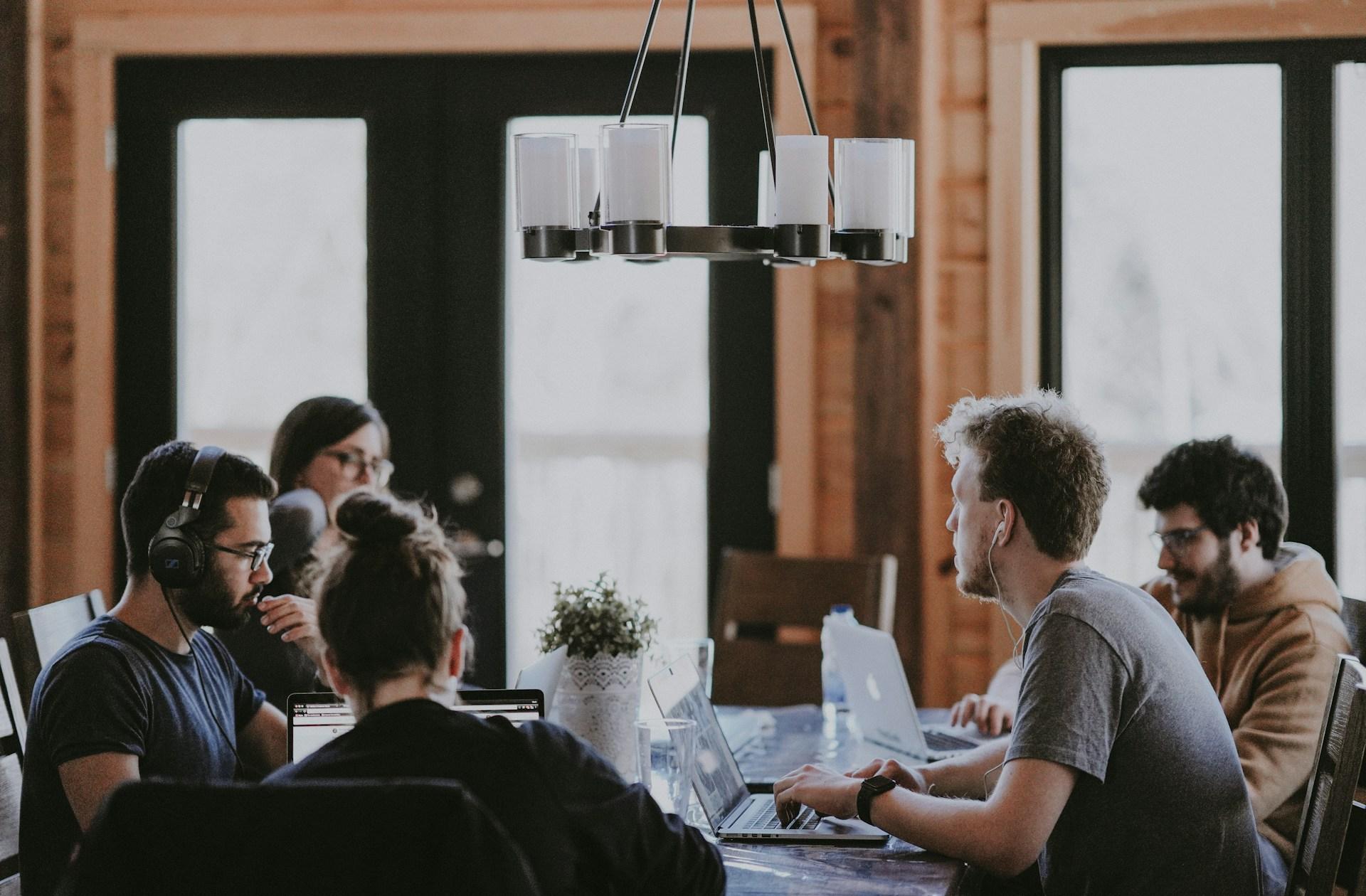 Structured teamwork illustrating systematic local SEO benefits.